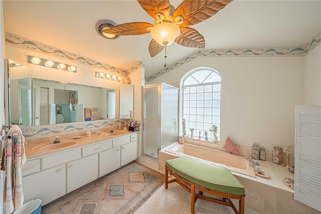 bathroom with separate shower and tub, ceiling fan, vanity, and vaulted ceiling