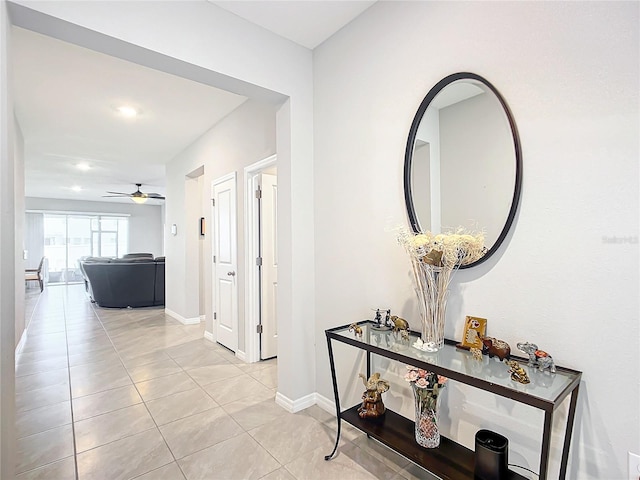 hallway featuring light tile patterned floors