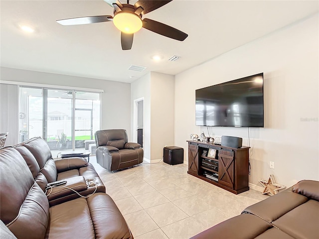 tiled living room featuring ceiling fan