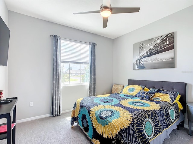 bedroom with ceiling fan and carpet floors