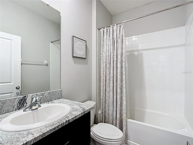 full bathroom with vanity, toilet, and shower / tub combo with curtain