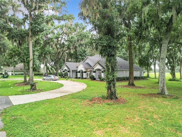 exterior space with a front lawn