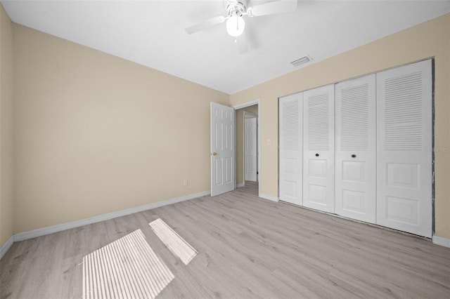 unfurnished bedroom featuring a closet, ceiling fan, and light hardwood / wood-style floors