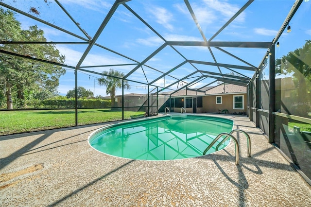 view of swimming pool featuring a lanai, a patio area, and a lawn