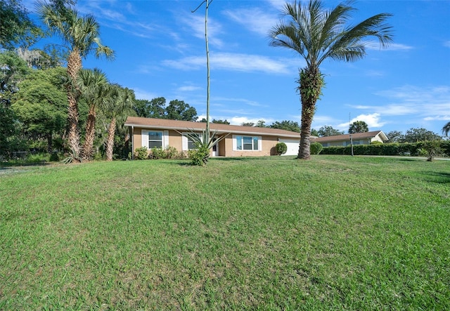 view of front of property with a front lawn