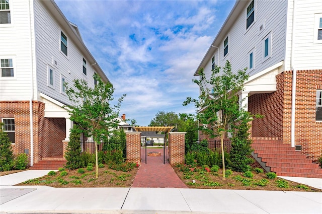 view of property's community featuring a pergola