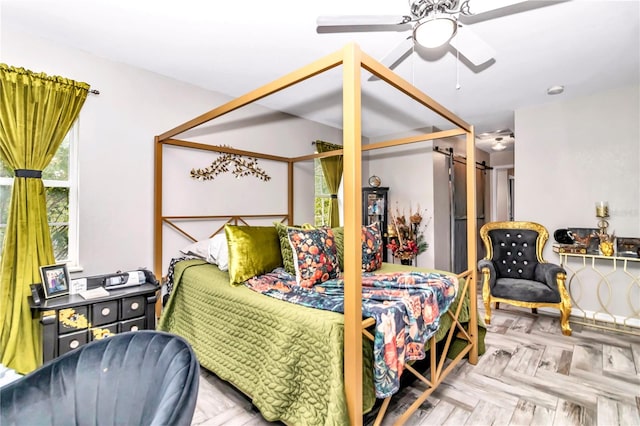 bedroom featuring parquet flooring and ceiling fan