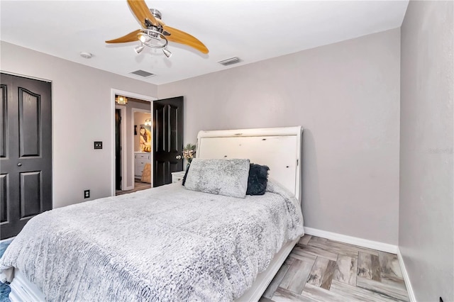 bedroom featuring light parquet floors and ceiling fan