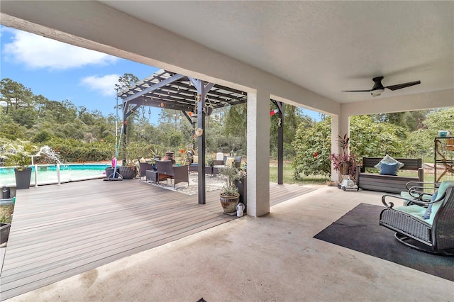 view of patio with a pool side deck, a pergola, an outdoor hangout area, and ceiling fan