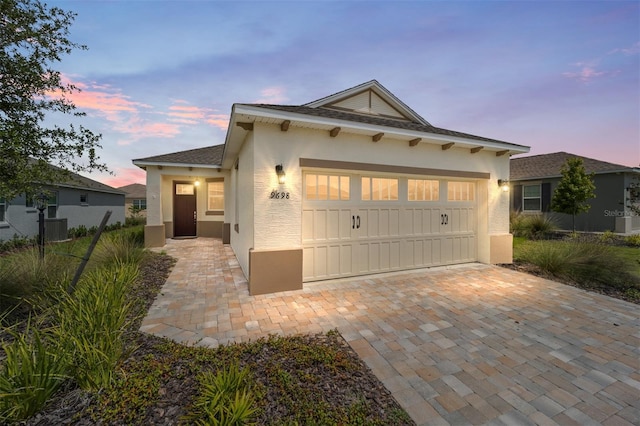 view of front of home featuring a garage