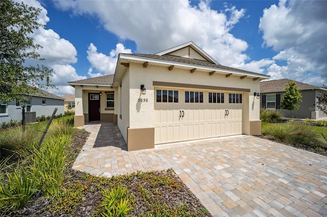 view of front of home with a garage