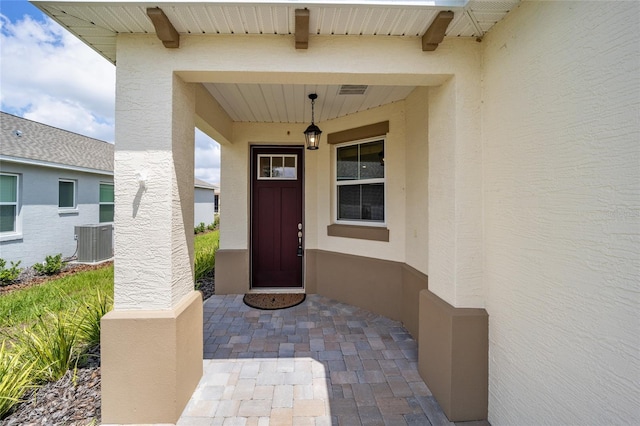 property entrance featuring cooling unit