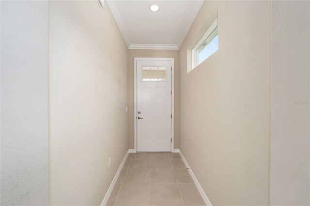 doorway with light tile patterned floors and ornamental molding