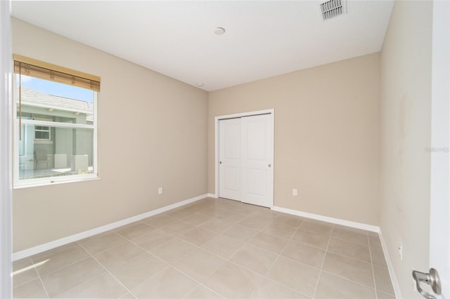 view of tiled empty room