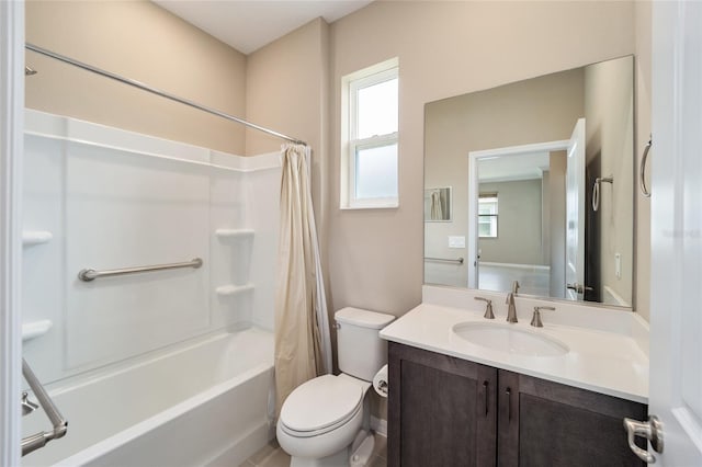 full bathroom with shower / bath combination with curtain, vanity, and toilet