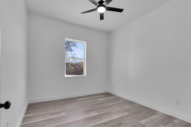 unfurnished room with light hardwood / wood-style flooring and ceiling fan