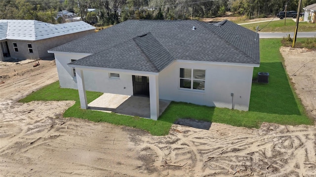 back of house with a patio and central AC unit