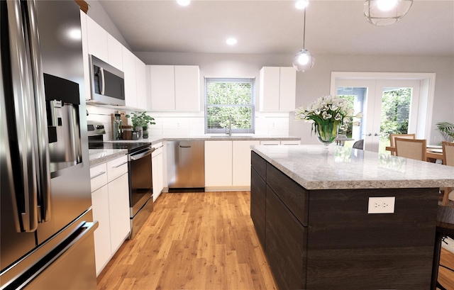 TBD Bay Court, Ocklawaha, FL 32179 - kitchen featuring modern cabinets, appliances with stainless steel finishes, a sink, pendant lighting, and french doors