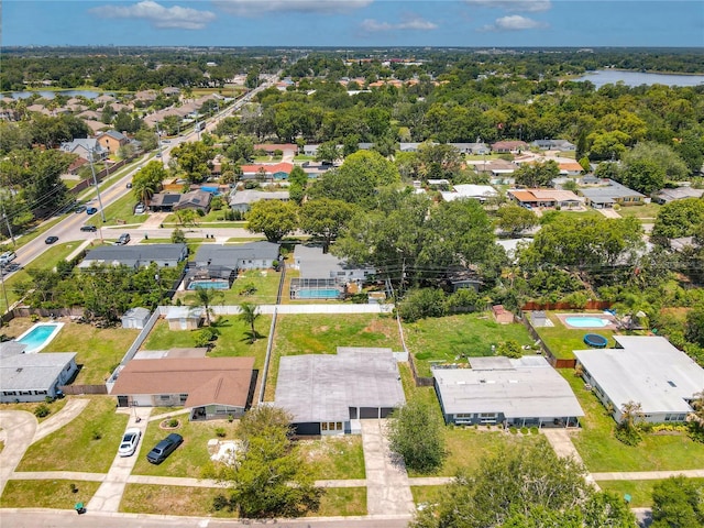 aerial view with a residential view and a water view