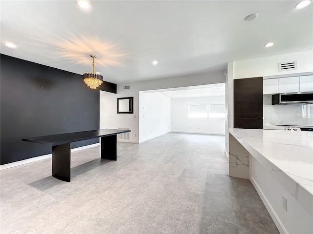 rec room with recessed lighting, visible vents, and baseboards