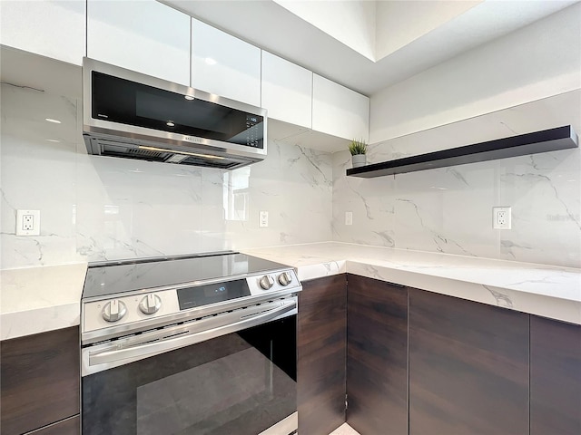 kitchen featuring open shelves, backsplash, appliances with stainless steel finishes, white cabinets, and modern cabinets