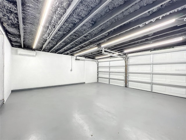 garage with a wall mounted air conditioner