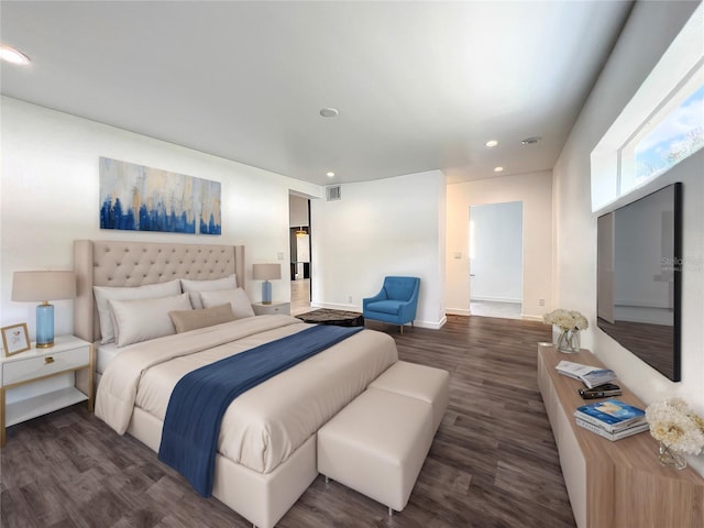 bedroom featuring baseboards, dark wood finished floors, visible vents, and recessed lighting