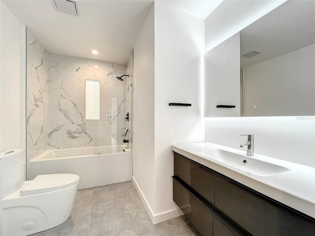 bathroom featuring toilet, vanity, visible vents, baseboards, and shower / washtub combination