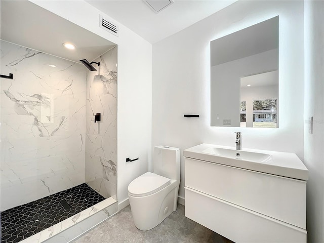 full bath featuring visible vents, a stall shower, vanity, and toilet