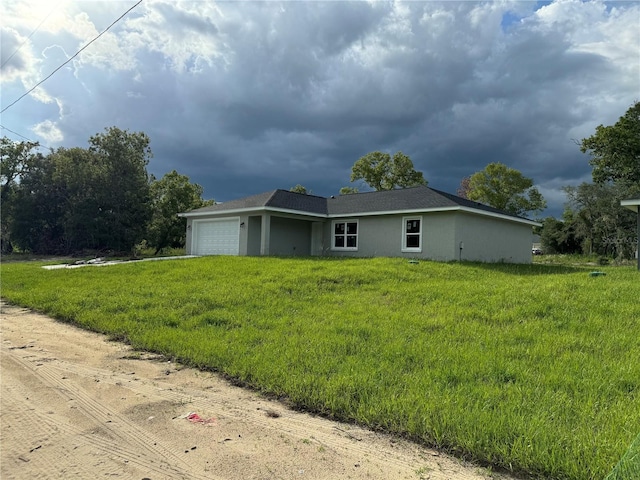 view of side of property with a garage