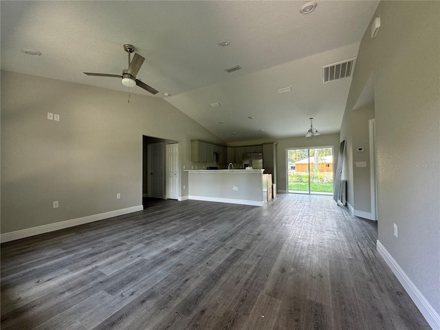 unfurnished living room with high vaulted ceiling, ceiling fan, and dark hardwood / wood-style floors