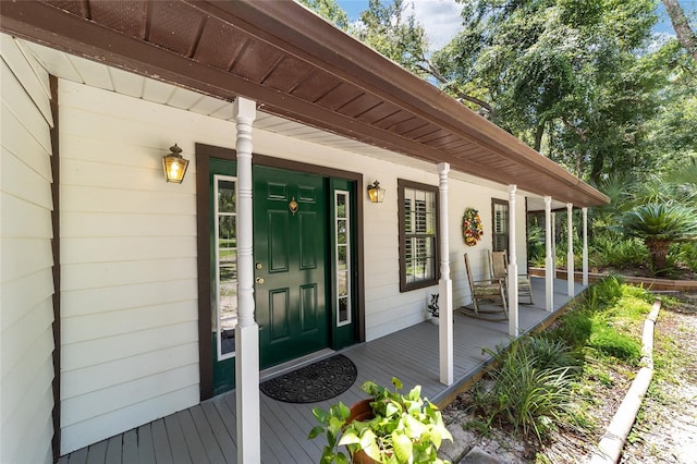 entrance to property with a porch