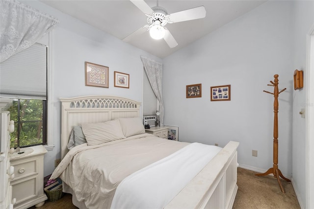 bedroom with ceiling fan, light colored carpet, and lofted ceiling