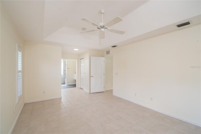 2260 NW 51st Ter, Ocala, FL 34482 - empty room featuring a ceiling fan and baseboards