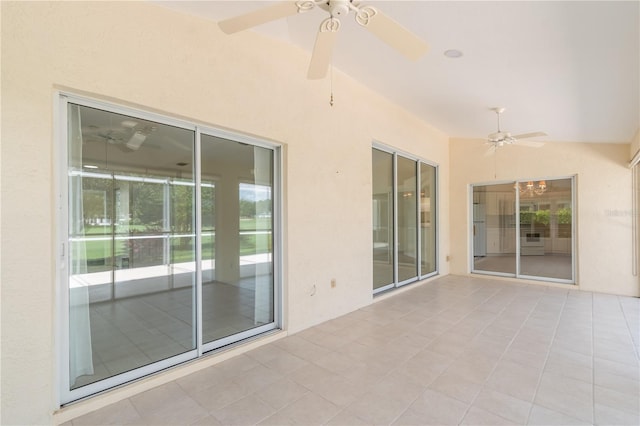 view of patio with ceiling fan