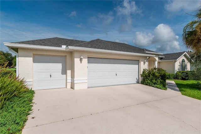 single story home featuring a garage