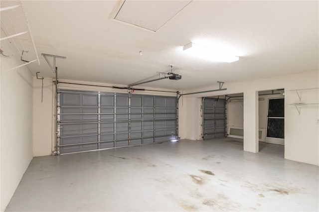 2260 NW 51st Ter, Ocala, FL 34482 - garage featuring a garage door opener