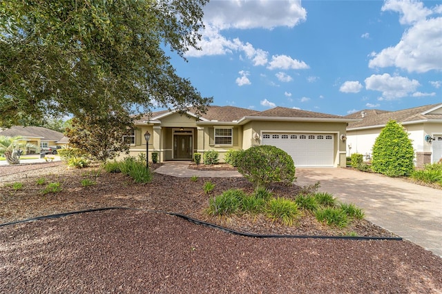 ranch-style home featuring a garage