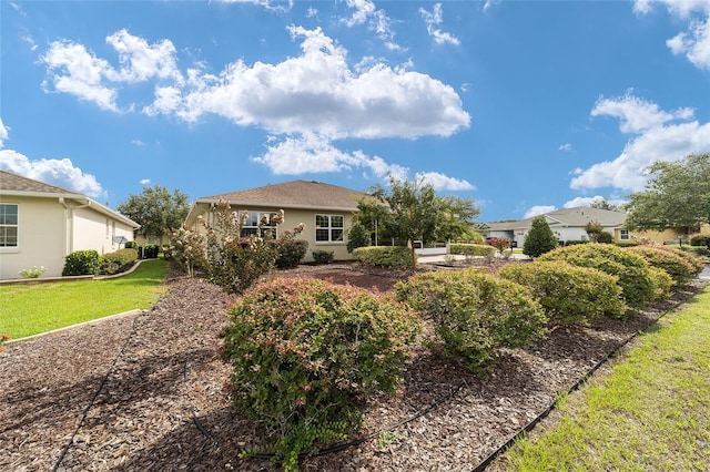 view of front of house with a front lawn