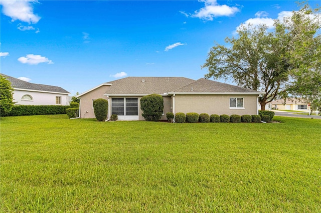 exterior space with a yard