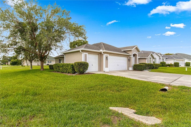 view of front of house with a garage and a front lawn