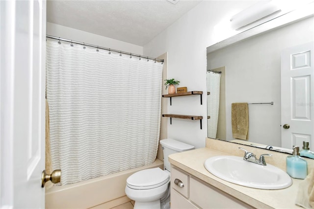 full bathroom with toilet, vanity, shower / tub combo with curtain, and a textured ceiling