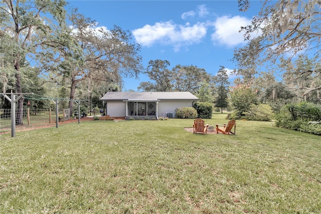 view of yard with a sunroom