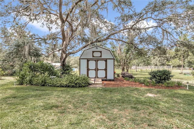 view of outdoor structure with a lawn