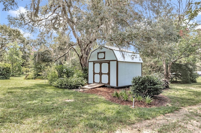 view of outdoor structure with a lawn