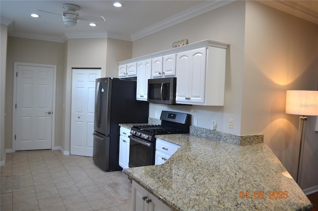 kitchen with white cabinets, crown molding, ceiling fan, light stone countertops, and stainless steel appliances