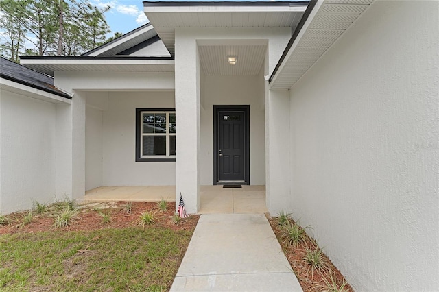 4444 SW 118th Ter, Ocala, FL 34481 - property entrance with stucco siding