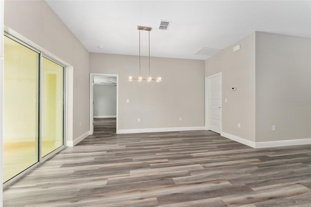 4444 SW 118th Ter, Ocala, FL 34481 - unfurnished dining area with wood finished floors and baseboards