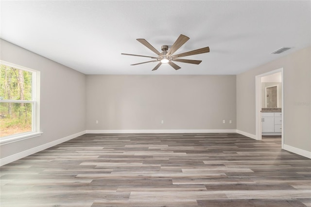 4444 SW 118th Ter, Ocala, FL 34481 - spare room with ceiling fan, baseboards, and wood finished floors