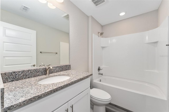 4444 SW 118th Ter, Ocala, FL 34481 - full bathroom with toilet,  shower combination, vanity, and wood finished floors